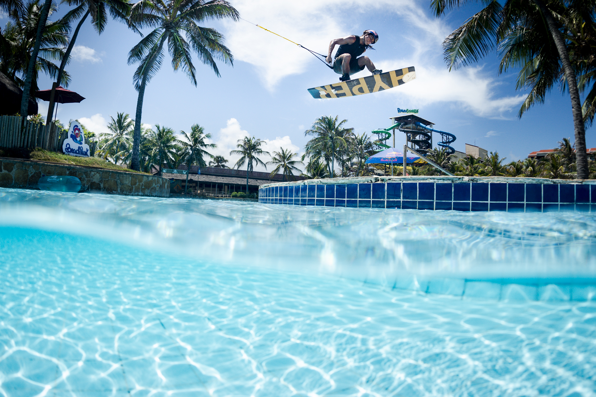 Watch Professional Red Bull Wakeboarder Pedro Caldas Take on 82-Foot Water Slide in Beach Park!